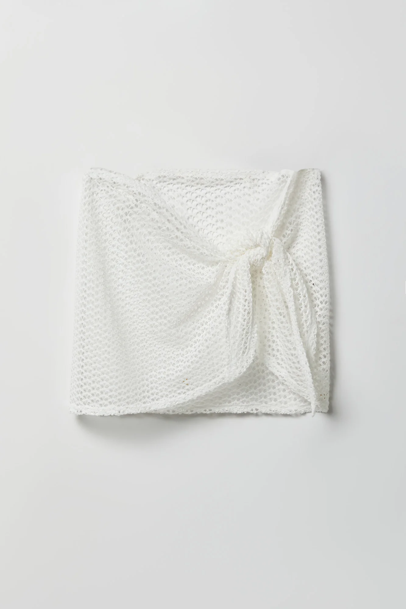 7007-crochet-mini-sarong-cover-up-7.webp Crochet Mini Sarong Cover-Up