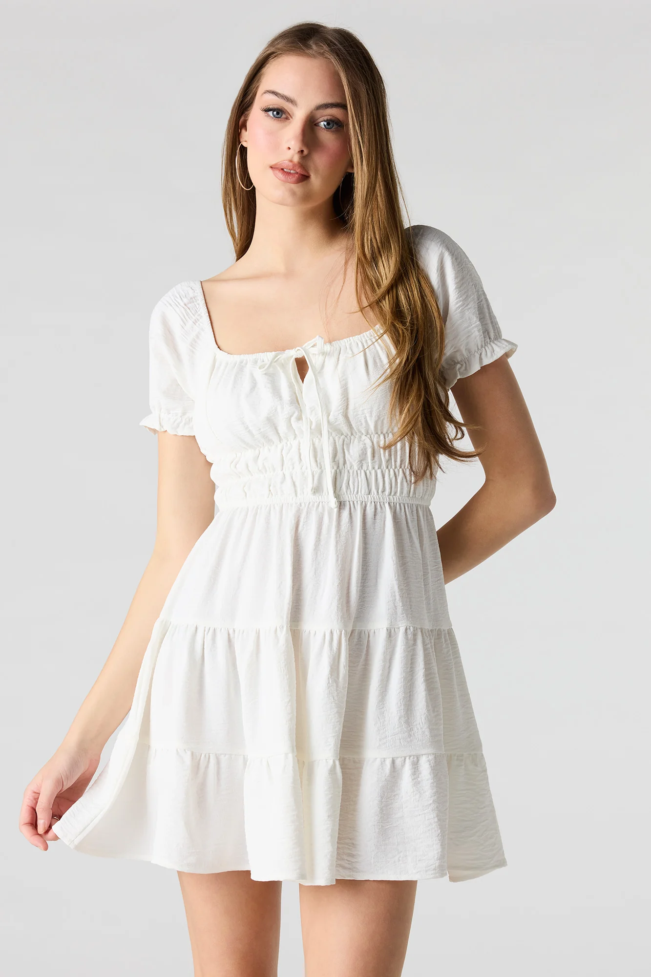 7347-short-puff-sleeve-tiered-mini-dress-10.webp Short Puff Sleeve Tiered Mini Dress
